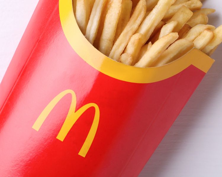 A photo of a large fries order from a popular fast-food restaurant, McDonald's.