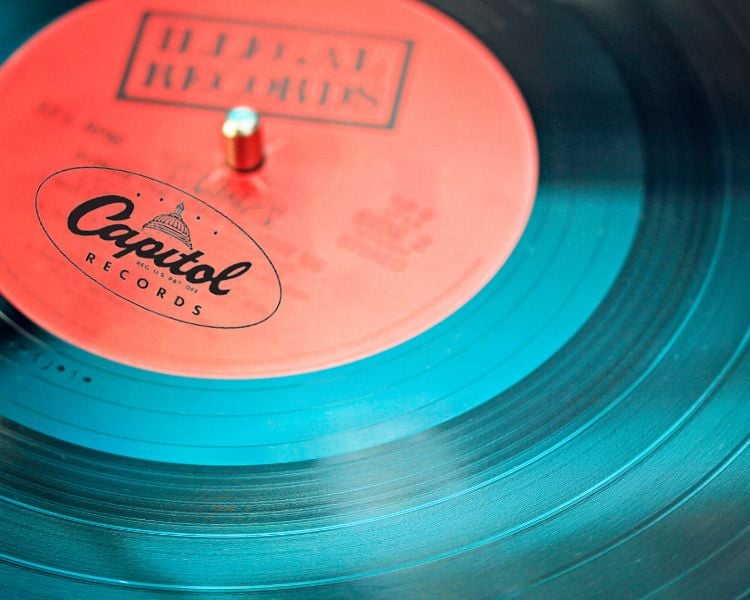 A logo design of a record label brand capital records on a vinyl record