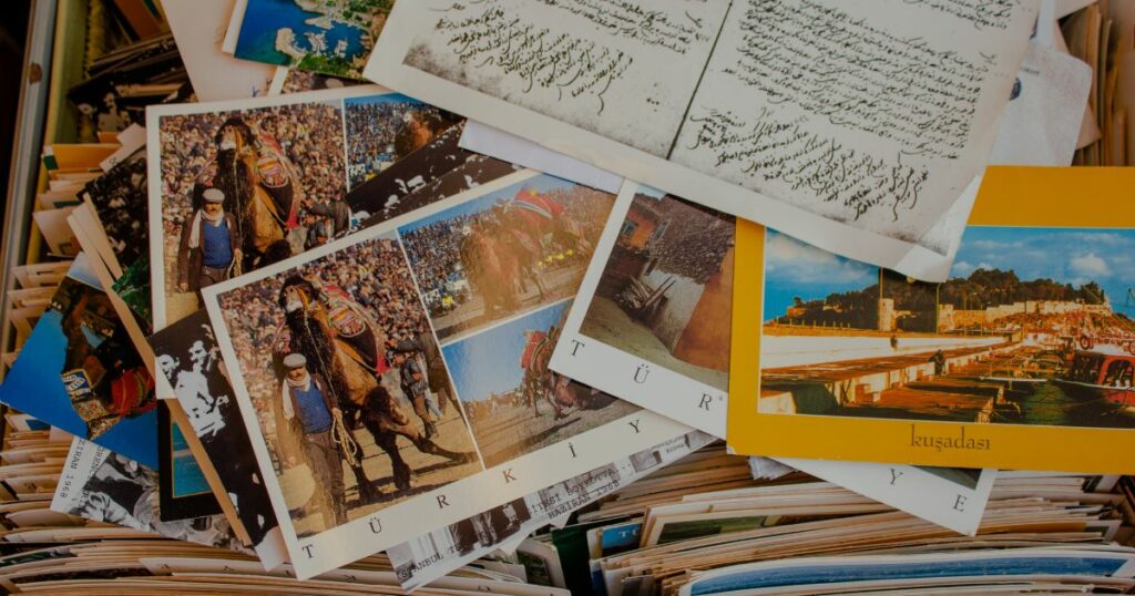 a random postcards scattered over a compilation of more random postcards
