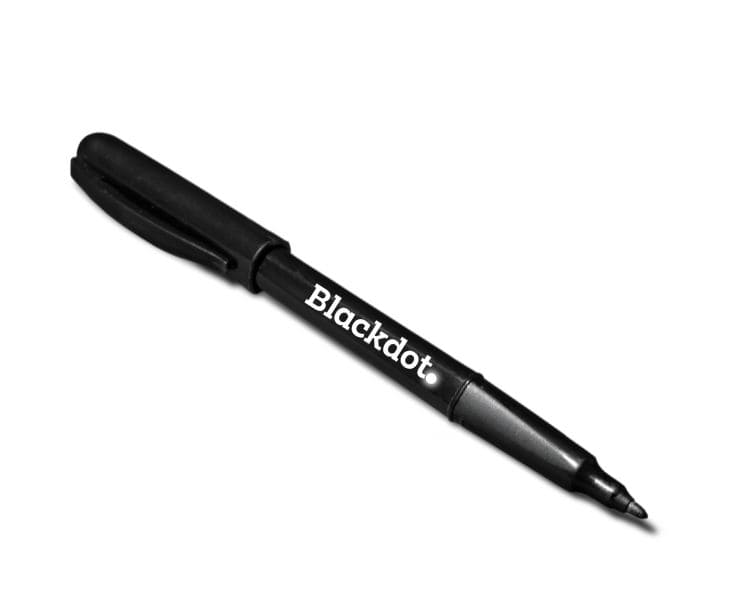 A ballpen mockup for a brand named blackdot generated using an AI logo generator logomakerr.ai