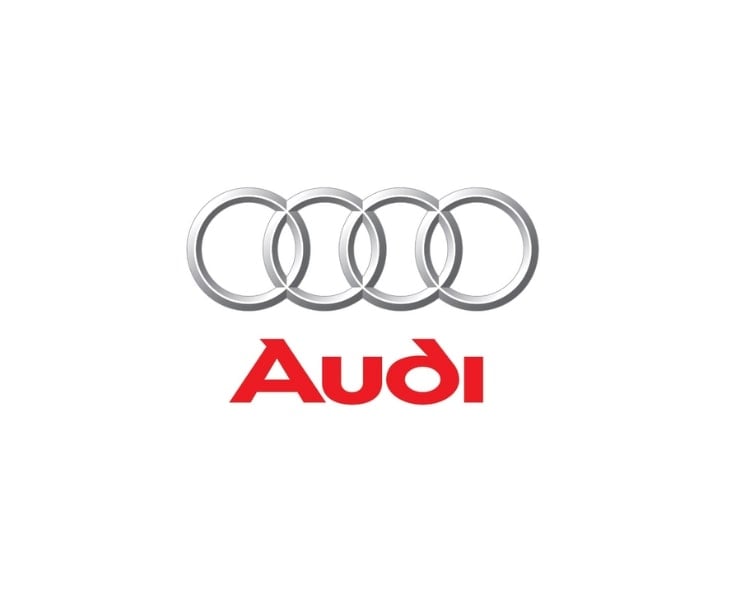 An official logo design of the German automotive company Audi featuring four rings intertwined together above the brand name.