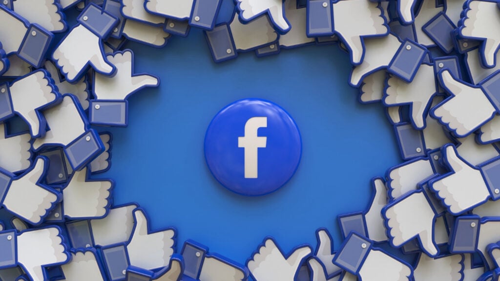 Facebook logo is centered in a blue circle, encircled by numerous thumbs-up or like icons.