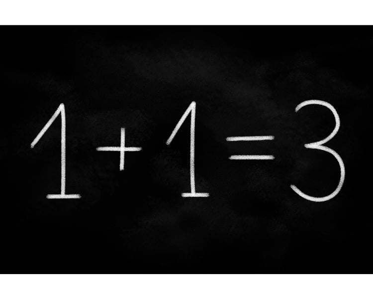 a wrong math equation: one plus one equals three written by using chalk.