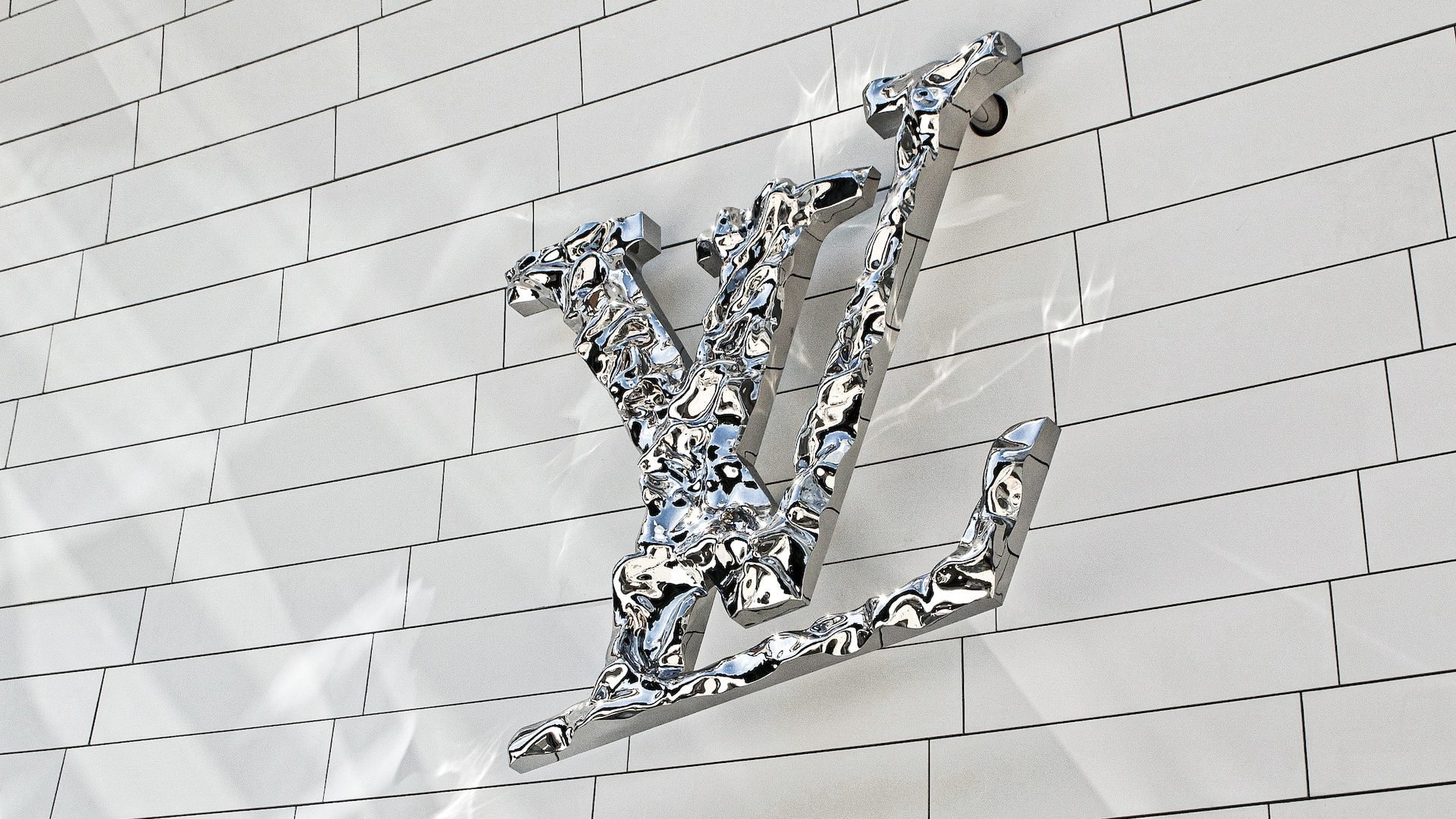 The white facade features an LV logo design representing the French fashion luxury company Louis Vuitton.