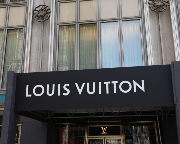 Louie Vuitton store while the image only shows the brand name within the store
