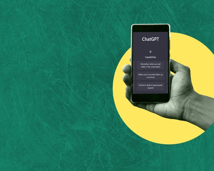 ChatGPT mobile app on a smartphone with the background in macaroon yellow and pine green