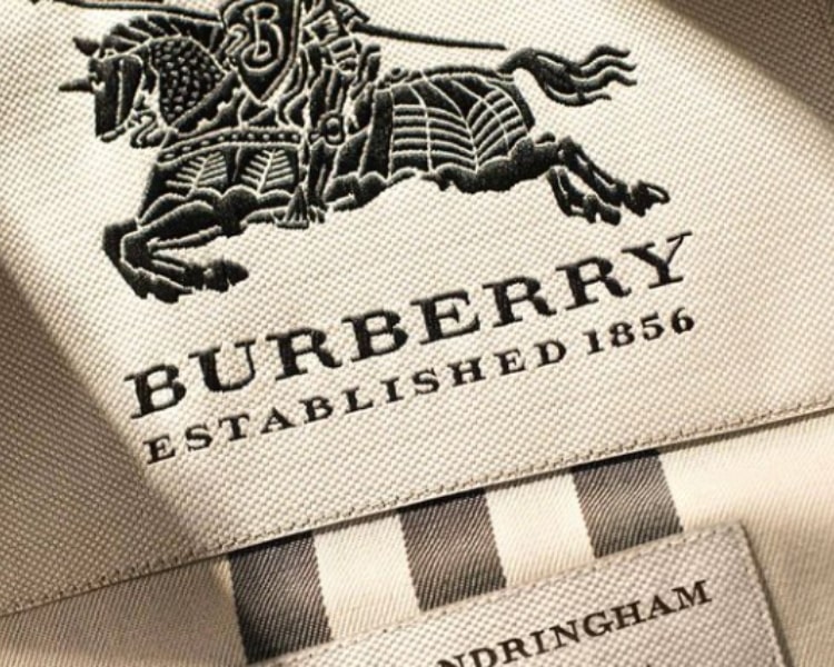 The official logo design of the British luxury brand Burberry is printed on one of its products.