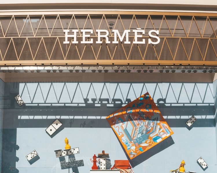 The logo design signage of the French luxury brand Hermes outside one of its unique boutiques.