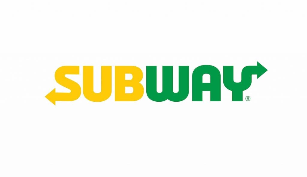 The official logo design of an American multinational fast-food restaurant named Subway features yellow and green font on a white background.