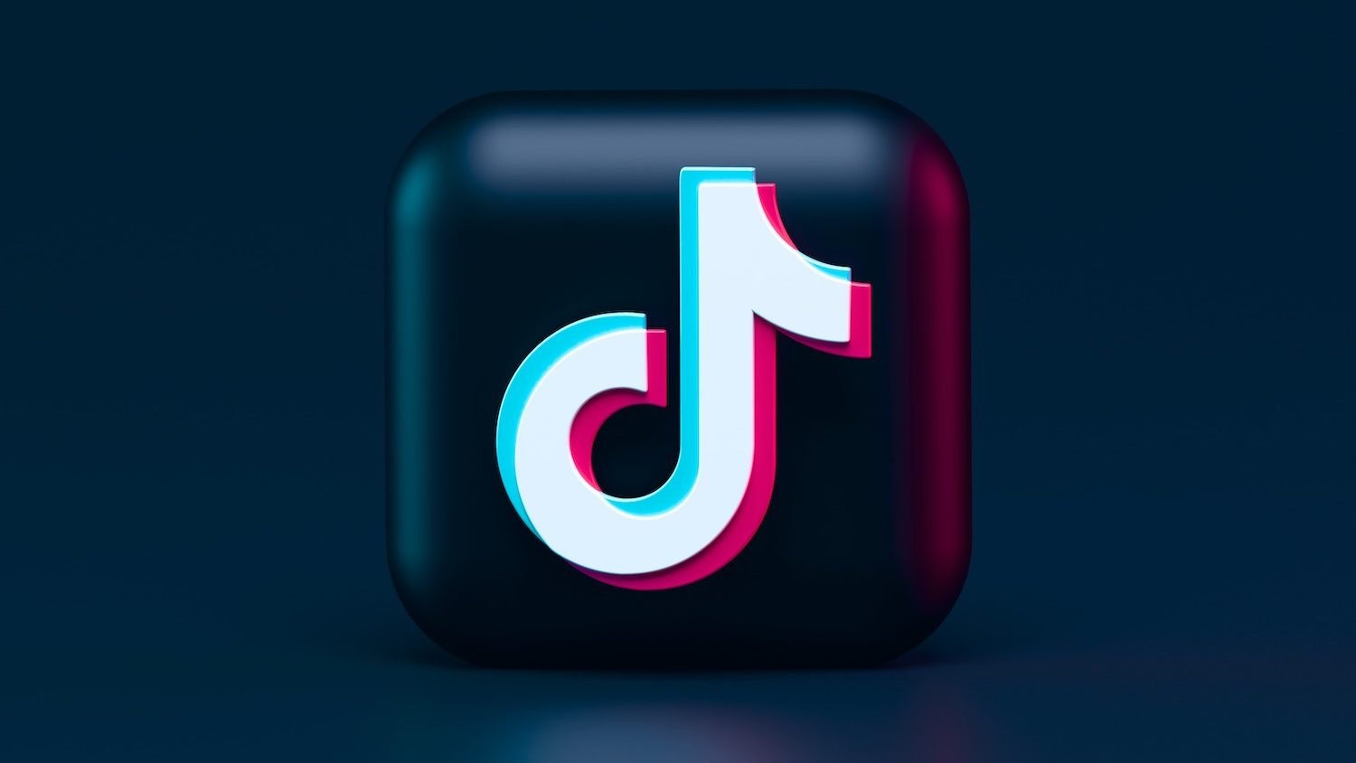 On a black squircle, there is a 3D logo design illustration of the social media application TikTok.