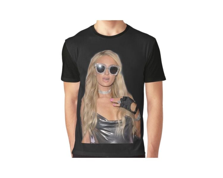 A male clothing model is wearing a black t-shirt with Paris Hilton wearing sunglasses print.
