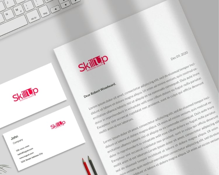 SkillUp letterhead examples on a white paper mockups like bond paper and contact card