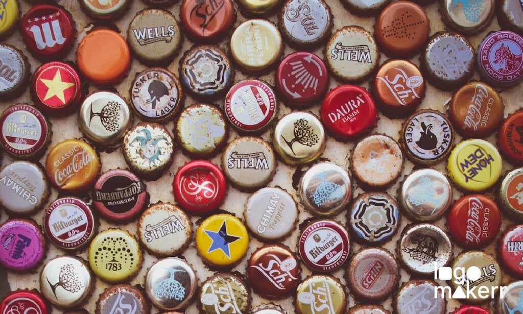 A collection of different styles of old and rusted metal bottle caps.