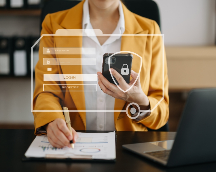 Woman holding a phone while writing with pen in one hand, and a big photo shown in regards to privacy and security.