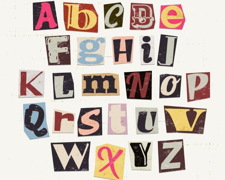 Various letters cut out from different papers and glued onto a white background to complete the alphabet.