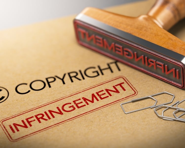 copyright infringement as written in a cardboard paper