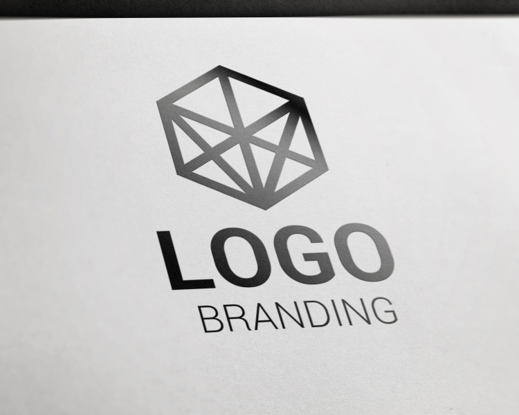 the word logo branding written on a white paper with an unique icon on top, tp symbolize business logo design