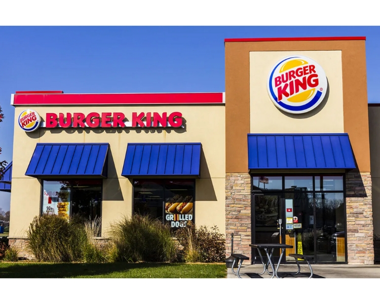 a great-looking burger king restaurant with a huge icon and wordmark logo outside the restaurant
