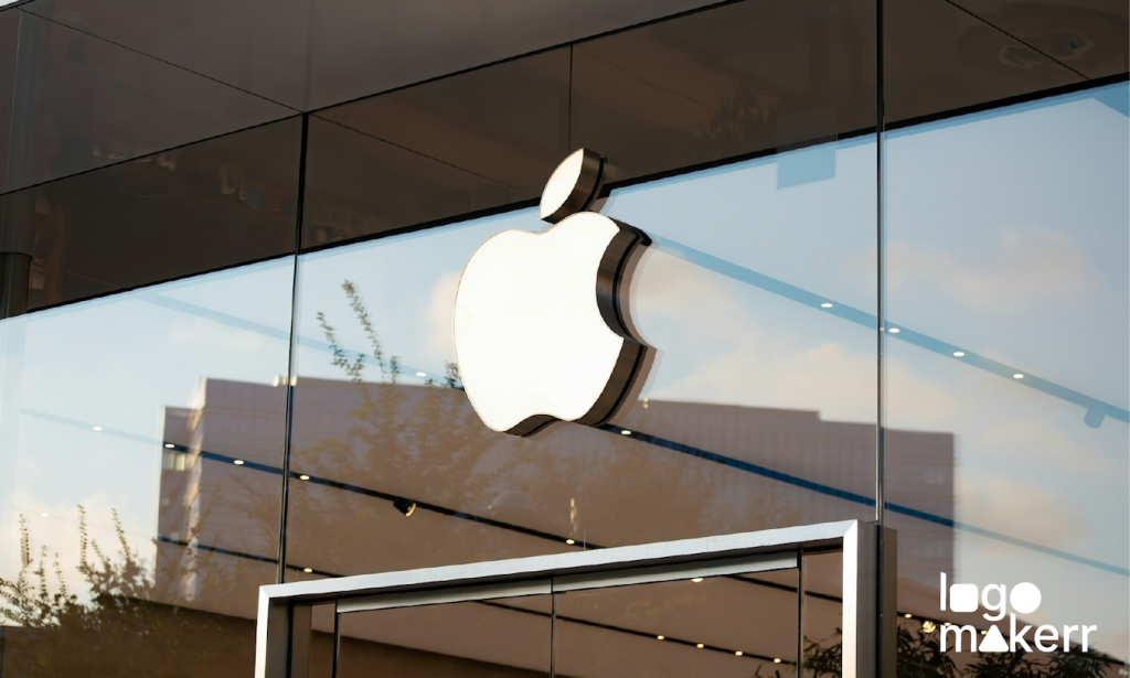 Apple white logo above the main entrace of apple store