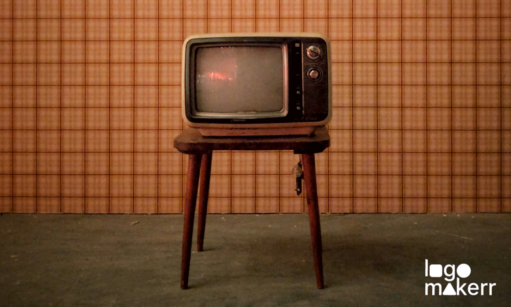 vintage TV in the brownish tiles wall