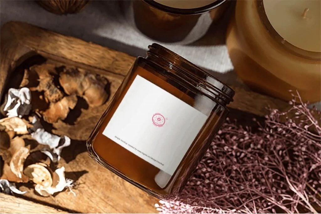 Amber product jar with a small centered symbol on a clear white packaging label